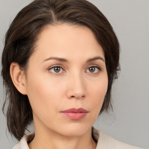 Neutral white young-adult female with medium  brown hair and brown eyes