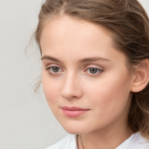 Neutral white young-adult female with medium  brown hair and grey eyes