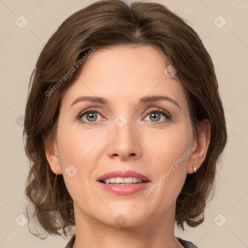 Joyful white young-adult female with medium  brown hair and green eyes