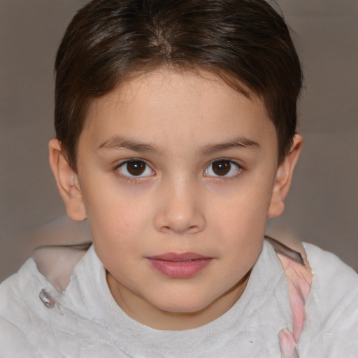 Joyful white child female with short  brown hair and brown eyes