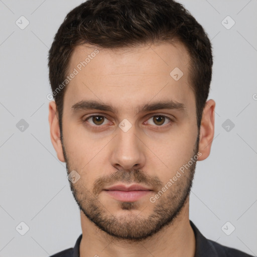 Neutral white young-adult male with short  brown hair and brown eyes