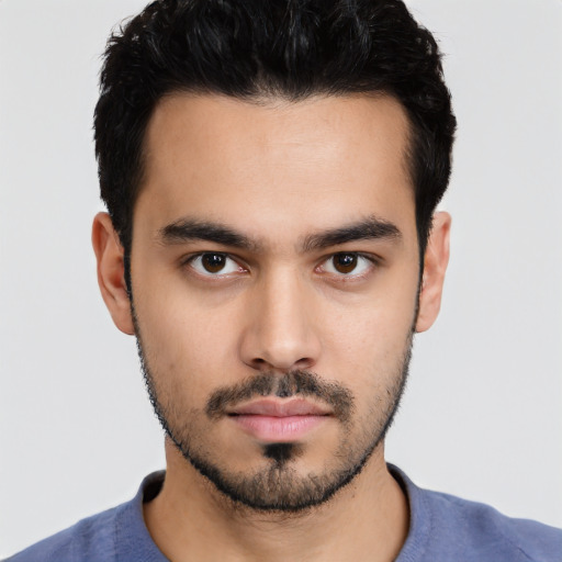Neutral white young-adult male with short  black hair and brown eyes