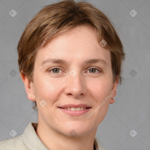 Joyful white young-adult female with short  brown hair and grey eyes