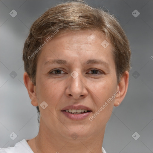 Joyful white adult female with short  brown hair and brown eyes