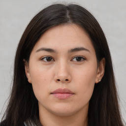 Neutral asian young-adult female with long  brown hair and brown eyes