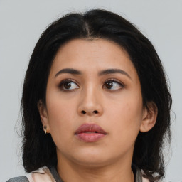 Neutral asian young-adult female with medium  black hair and brown eyes