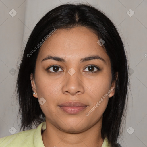 Joyful latino young-adult female with medium  brown hair and brown eyes