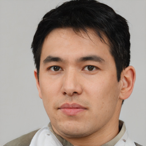 Neutral asian young-adult male with short  black hair and brown eyes