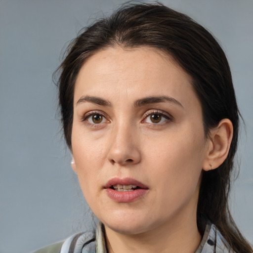 Neutral white young-adult female with medium  brown hair and brown eyes