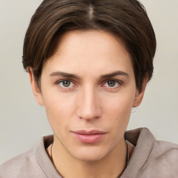 Neutral white young-adult female with short  brown hair and grey eyes