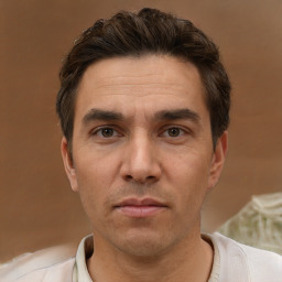 Neutral white adult male with short  brown hair and brown eyes