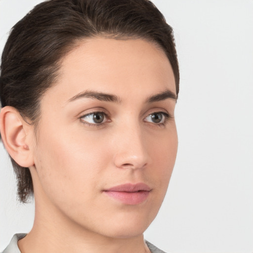 Neutral white young-adult female with medium  brown hair and brown eyes