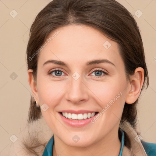 Joyful white young-adult female with medium  brown hair and grey eyes