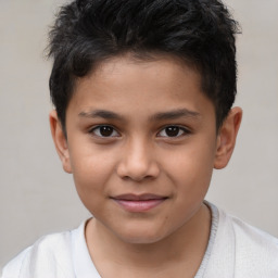 Joyful white child male with short  brown hair and brown eyes