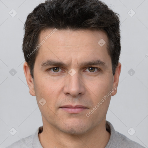 Neutral white adult male with short  brown hair and brown eyes