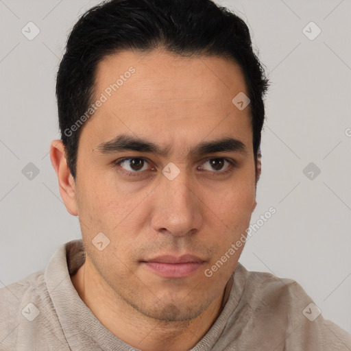 Neutral latino young-adult male with short  brown hair and brown eyes