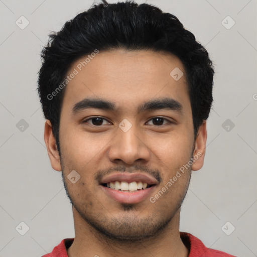 Joyful asian young-adult male with short  black hair and brown eyes