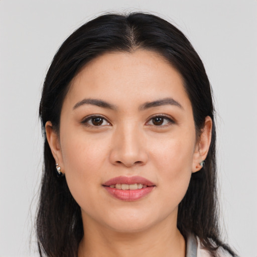Joyful asian young-adult female with medium  black hair and brown eyes
