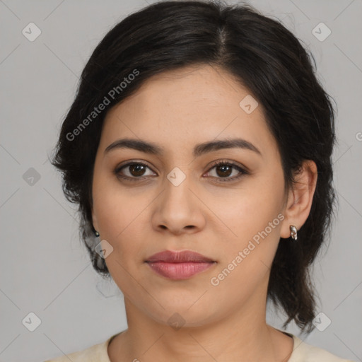 Joyful latino young-adult female with medium  black hair and brown eyes