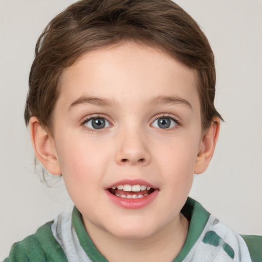 Joyful white child female with short  brown hair and grey eyes