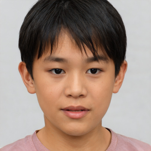 Neutral asian child male with short  brown hair and brown eyes