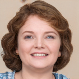 Joyful white young-adult female with medium  brown hair and blue eyes