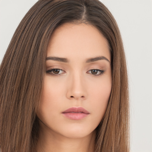 Neutral asian young-adult female with long  brown hair and brown eyes