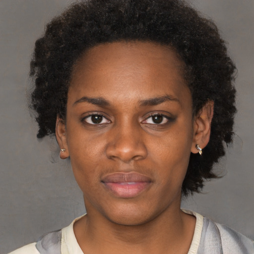 Neutral black young-adult female with short  black hair and brown eyes