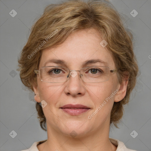 Joyful white adult female with medium  brown hair and blue eyes