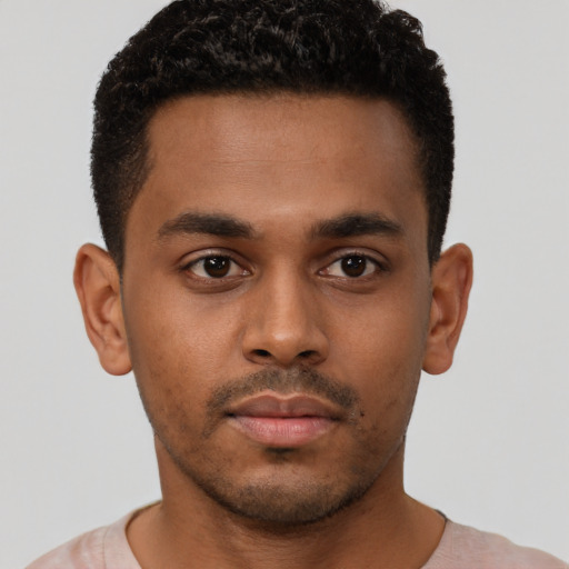 Neutral black young-adult male with short  brown hair and brown eyes