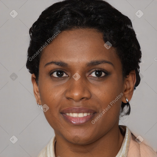 Joyful black young-adult female with short  brown hair and brown eyes