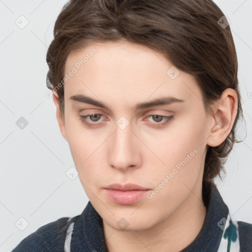 Neutral white young-adult female with medium  brown hair and grey eyes