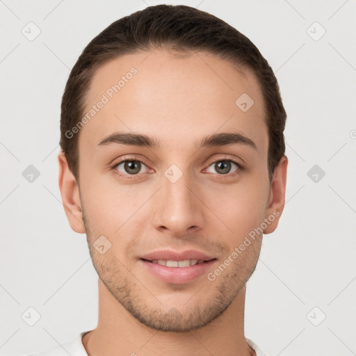 Joyful white young-adult male with short  brown hair and brown eyes