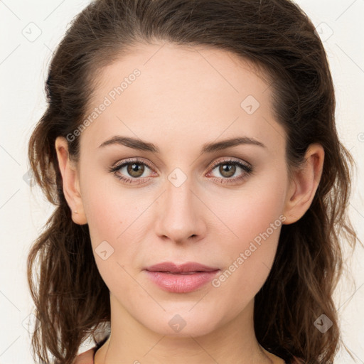 Joyful white young-adult female with long  brown hair and green eyes