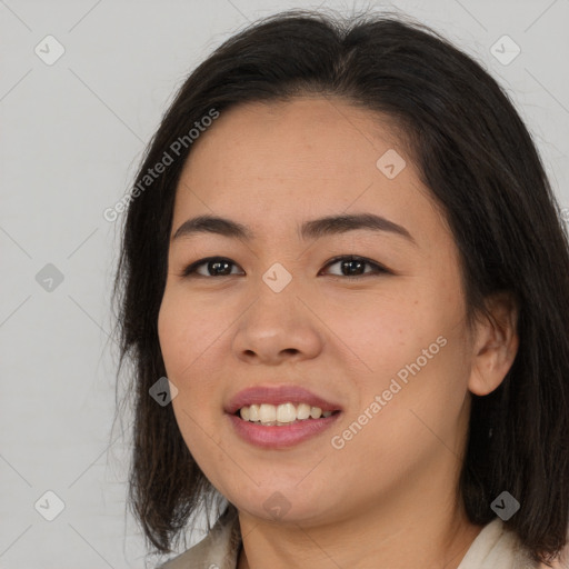 Joyful asian young-adult female with medium  brown hair and brown eyes