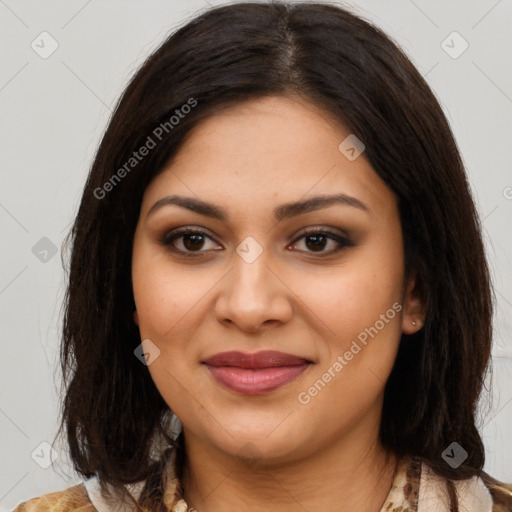 Joyful latino young-adult female with long  brown hair and brown eyes