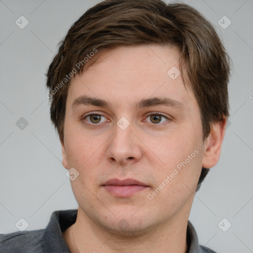 Neutral white young-adult male with short  brown hair and grey eyes