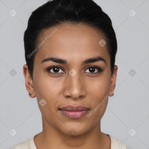 Joyful latino young-adult female with short  black hair and brown eyes