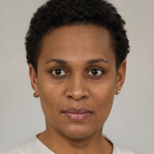Neutral black young-adult female with short  black hair and brown eyes