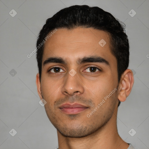 Neutral latino young-adult male with short  black hair and brown eyes
