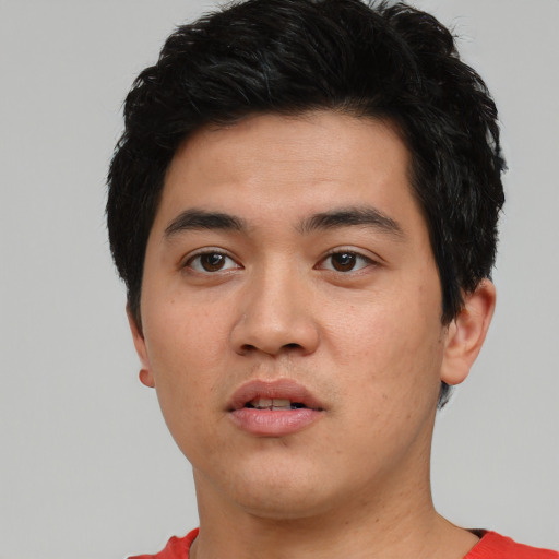 Neutral asian young-adult male with short  black hair and brown eyes