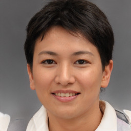 Joyful asian young-adult female with short  brown hair and brown eyes