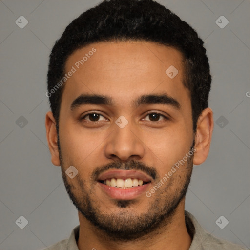 Joyful latino young-adult male with short  black hair and brown eyes