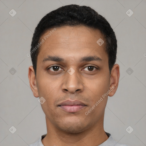 Neutral latino young-adult male with short  black hair and brown eyes
