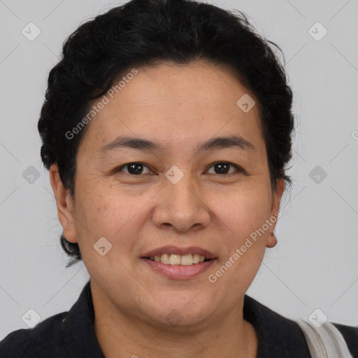 Joyful white adult female with short  brown hair and brown eyes