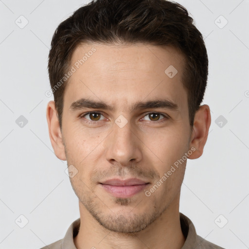 Joyful white young-adult male with short  brown hair and brown eyes
