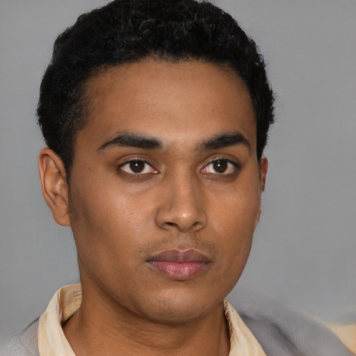 Neutral latino young-adult male with short  brown hair and brown eyes