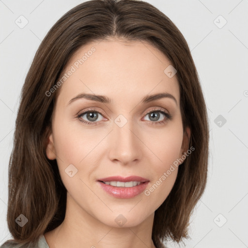 Joyful white young-adult female with long  brown hair and green eyes