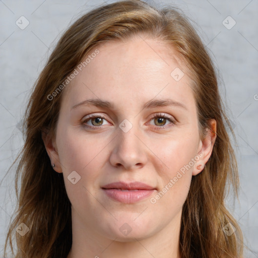 Joyful white young-adult female with medium  brown hair and blue eyes