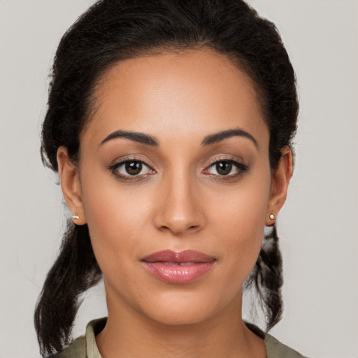 Joyful white young-adult female with medium  brown hair and brown eyes